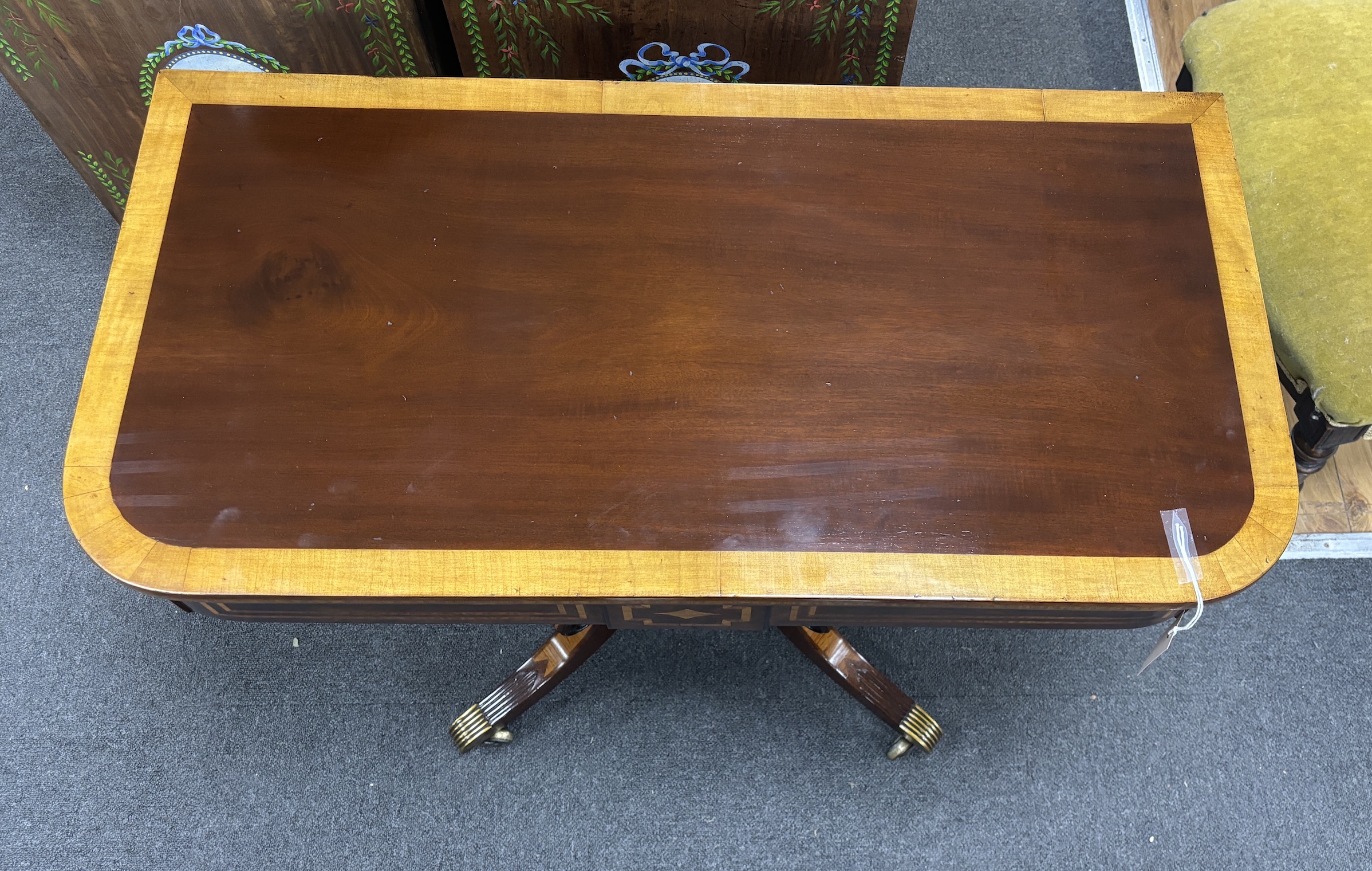 A Regency satinwood banded mahogany side table, adapted, width 90cm, depth 45cm, height 72cm.